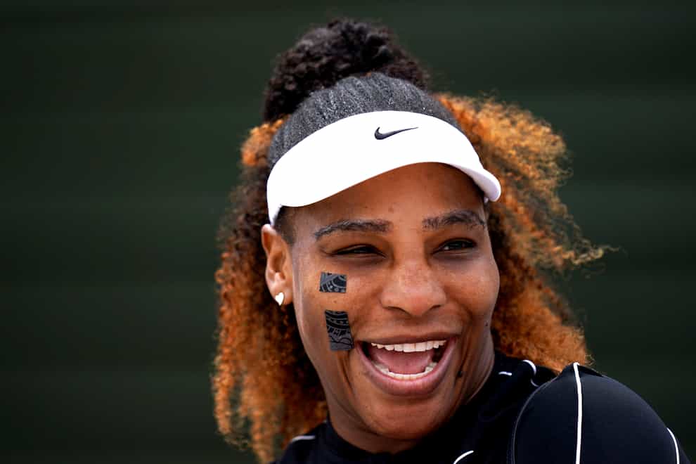 Serena Williams laughs during training at Wimbledon (John Walton/PA)