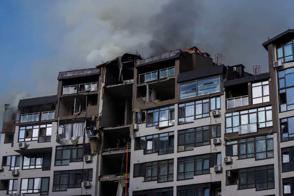 Smoke billows from a residential building following explosions in Kyiv, Ukraine (Nariman El-Mofty/AP)