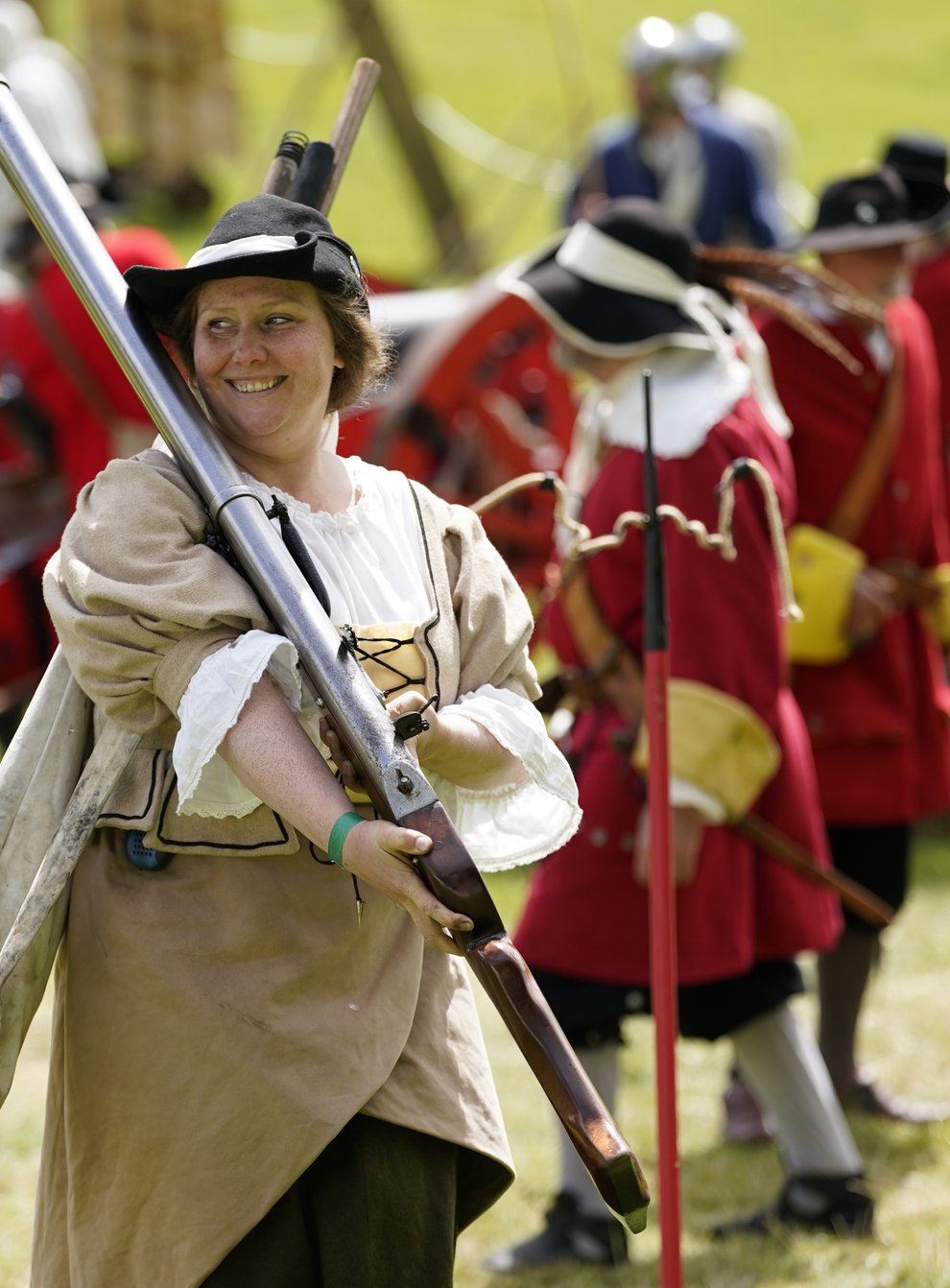 A member of the Wimborne Militia carries a rampart gun during the Chalke Valley History Festival at Broad Chalke, near Salisbury (Andrew Matthews/PA)