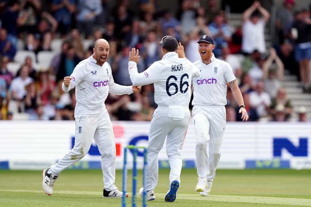 Jack Leach, left, celebrates a wicket on Sunday en route to his total of 10 for the match in England’s fourth Test against New Zealand (Mike Egerton/PA)