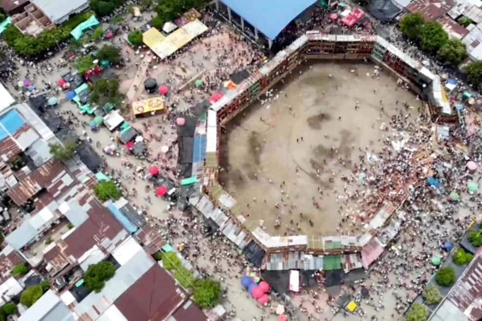 At least four people were dead and hundreds injured after wooden stands partially collapsed during a bullfight in central Colombia (AP)