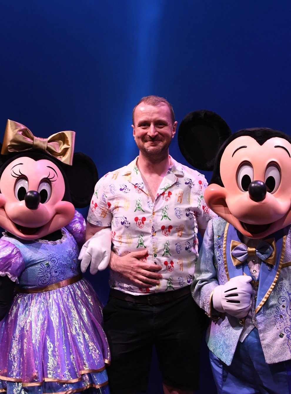 Damon Smith with Minnie Mouse and Mickey Mouse in their 50th anniversary attire (Damon Smith/PA)