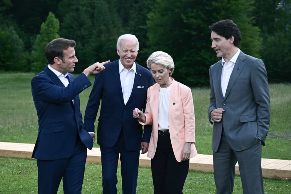 President Emmanuel Macron, US President Joe Biden, European Commission President Ursula von der Leyen and Canada’s Prime Minister Justin Trudeau leave after posing for a group photo during the G7 Summit (AP)