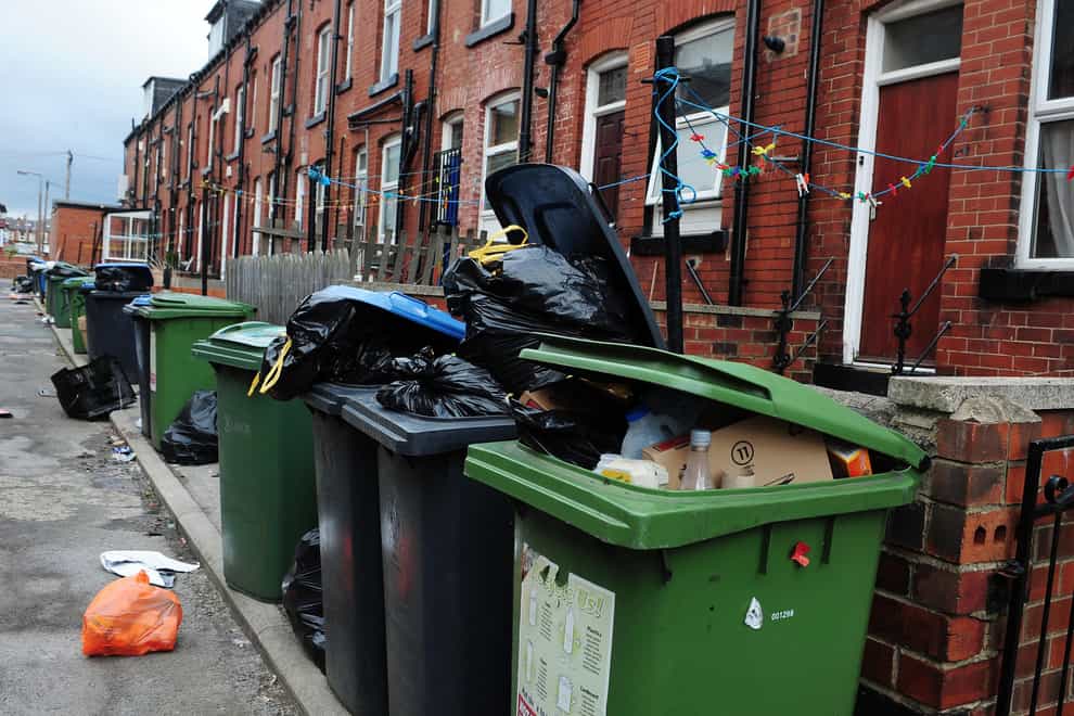 Bags of rubbish and overflowing bins (Anna Gowthorpe/PA)
