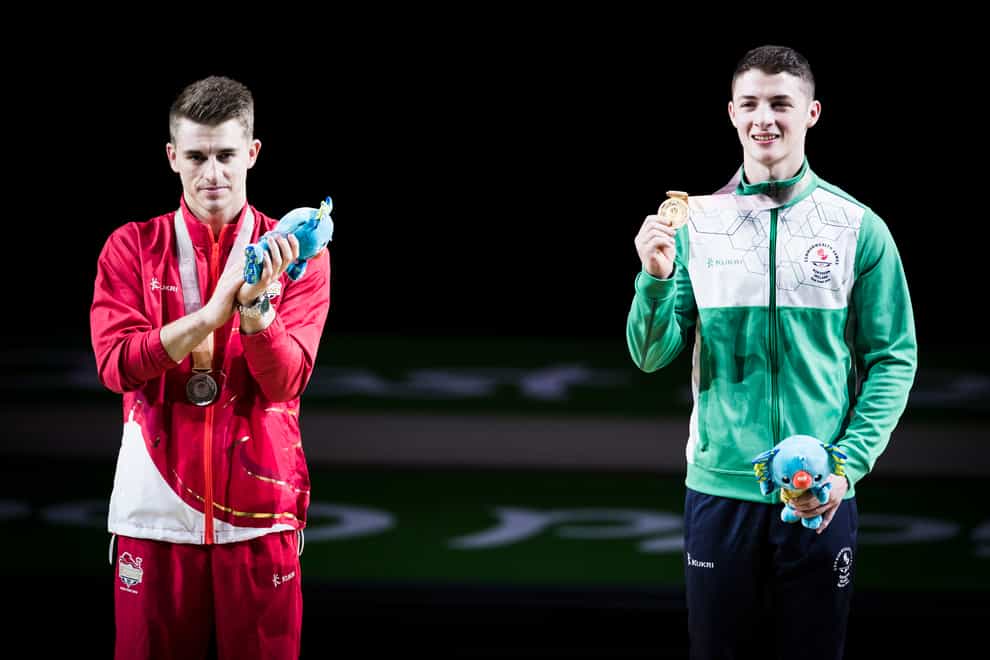 Rhys McClenaghan, right, beat Max Whitlock to gold four years ago (Danny Lawson/PA)