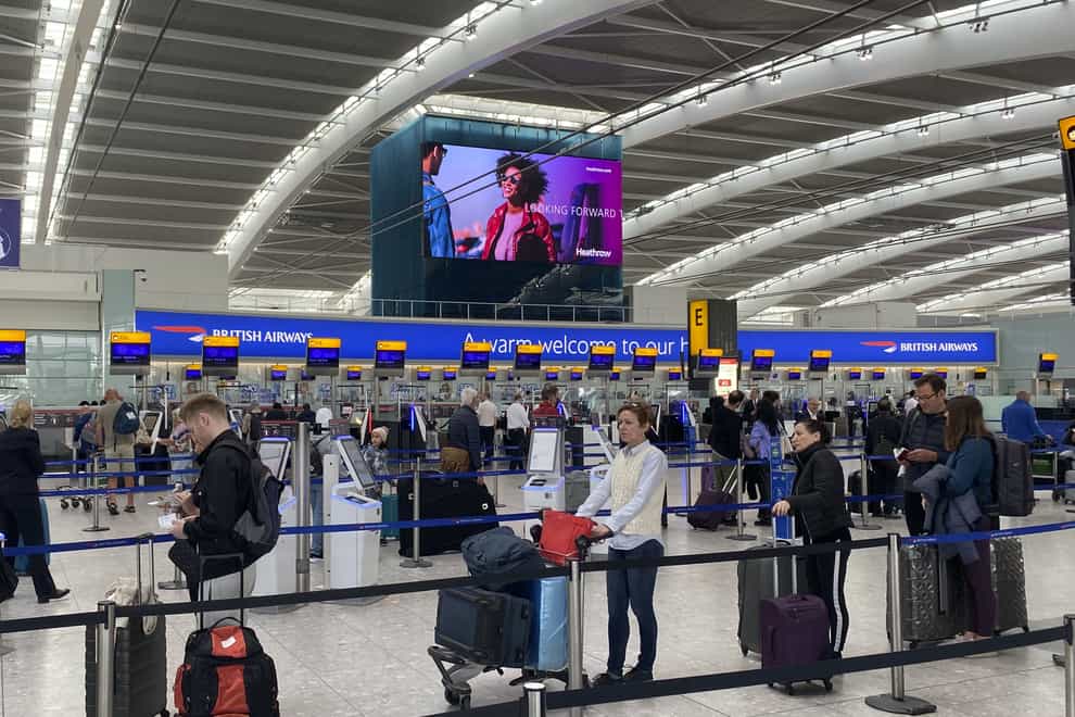 Heathrow Airport must reduce its passenger charges amid a surge in demand for travel, the aviation regulator has announced (Steve Parsons/PA)