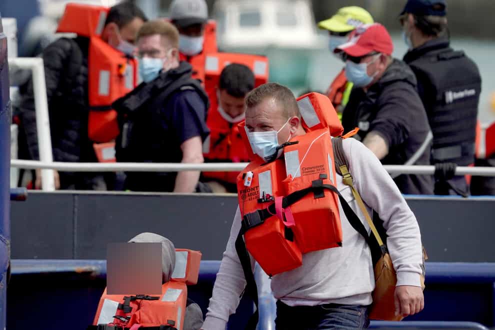 Migrants arriving in the UK (Gareth Fuller/PA)