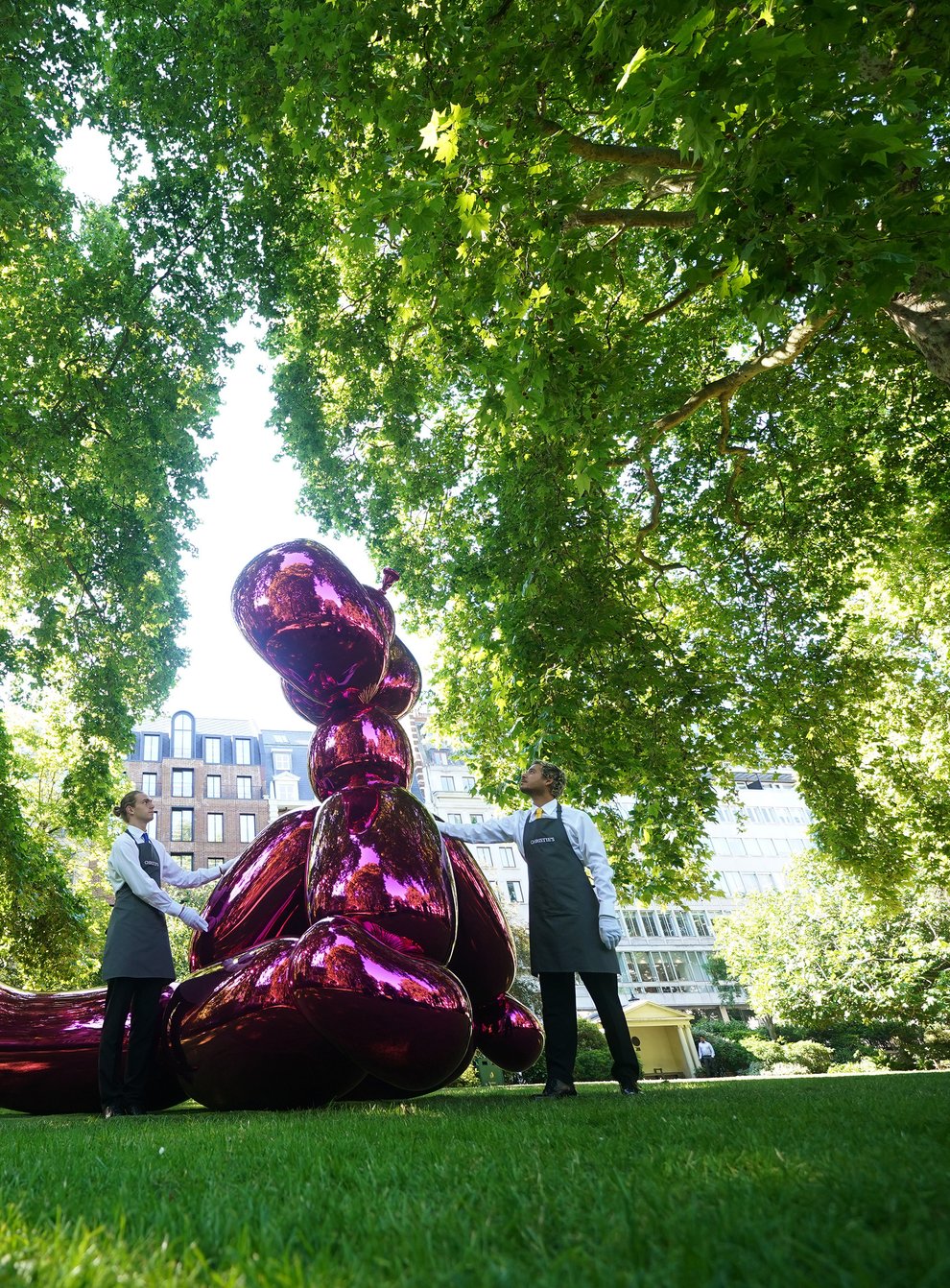 Balloon Monkey (Magenta) on display in St James’s Square, London (Yui Mok/PA)