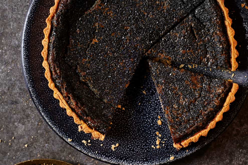 Black tahini and honey tart from Chetna’s Easy Baking (Nassima Rothacker/PA)