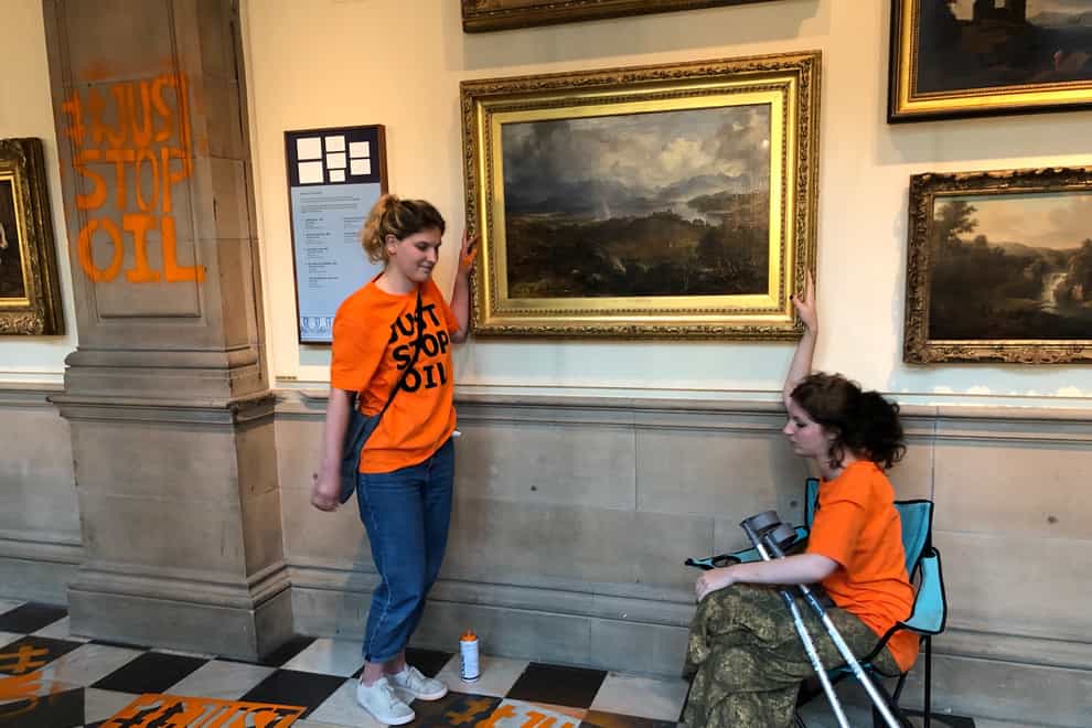 Protesters glued themselves to a painting at Kelvingrove Art Gallery in Glasgow (PA)