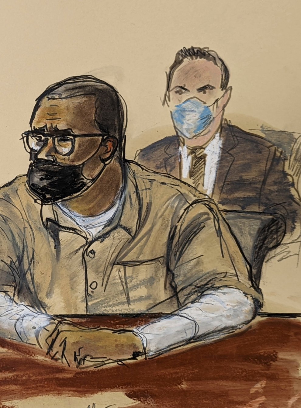 In this courtroom sketch, R Kelly and his attorney Jennifer Bonjean, left, appear during his sentencing hearing (Elizabeth Williams/PA)