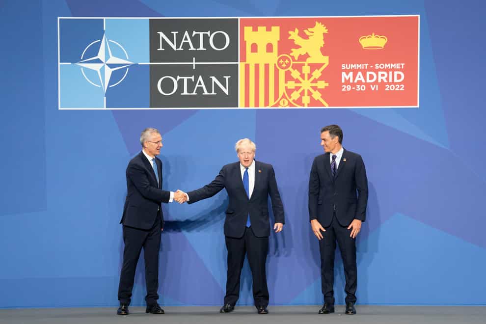Nato Secretary General Jens Stoltenberg, and Spanish Prime Minister Pedro Sanchez welcome Prime Minister Boris Johnson to the Nato summit in Madrid, Spain. Picture date: Wednesday June 29, 2022 (Stefan Rousseau/PA)