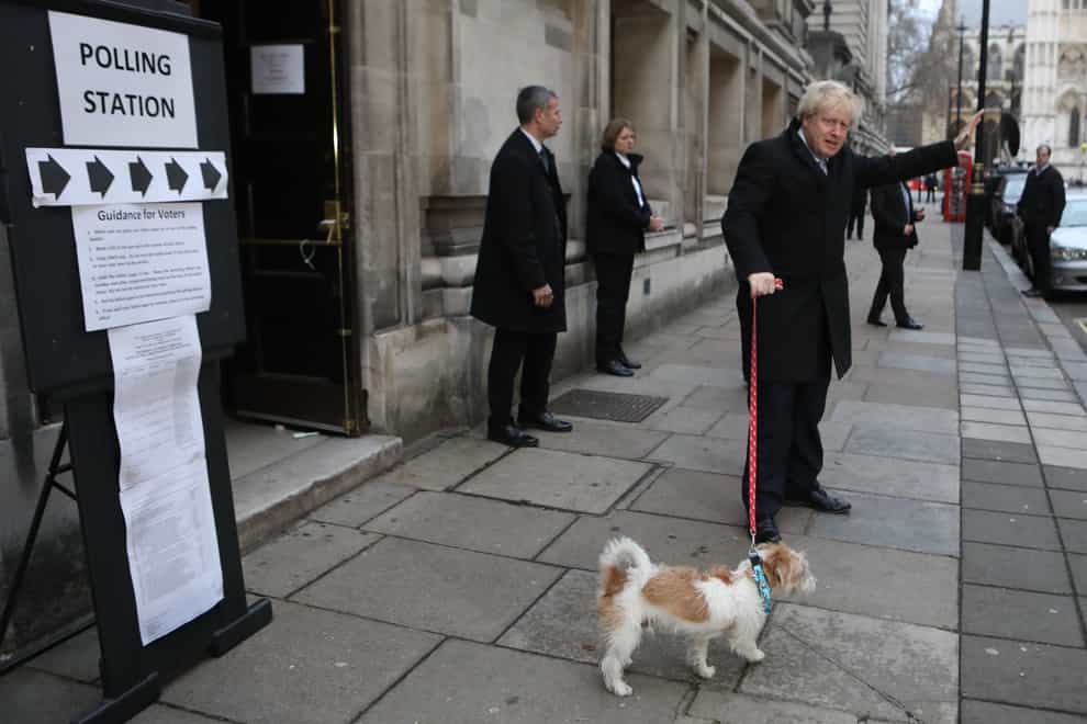 Prime Minister Boris Johnson leaves a polling station (Rick Findler/PA)