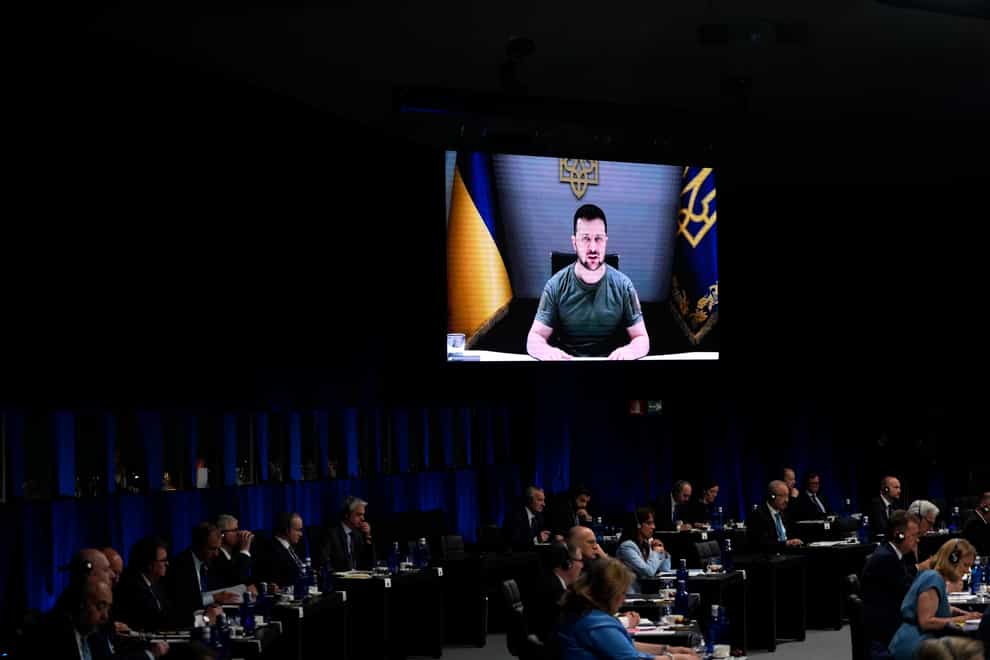 Ukraine’s President Volodymyr Zelensky addresses a Nato round table meeting via video link (AP)