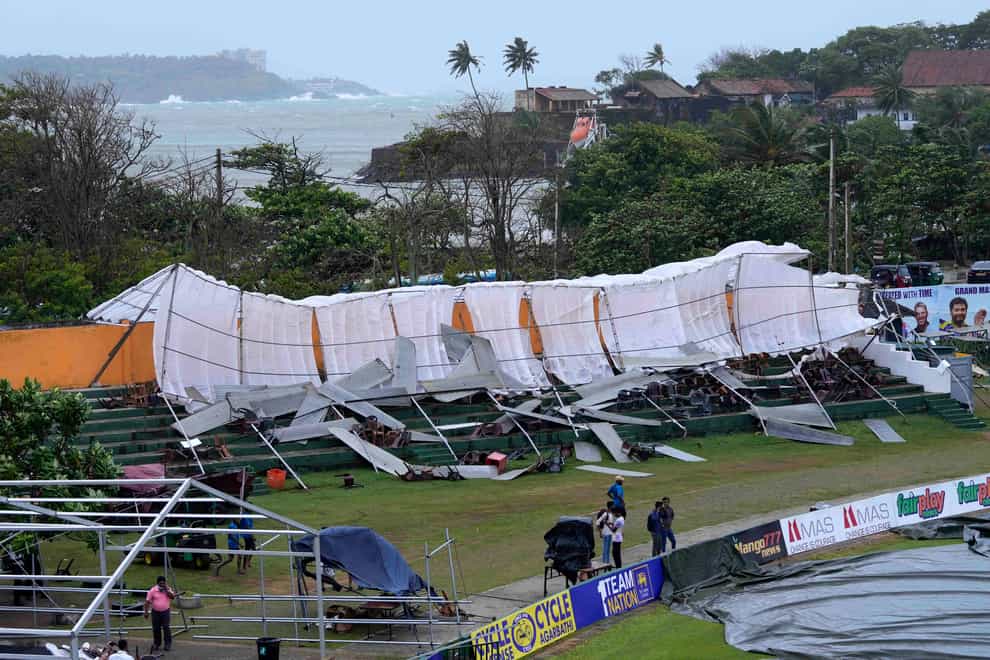 The roof of a makeshift spectator stand collapsed in Galle (Eranga Jayawardena/AP/PA)