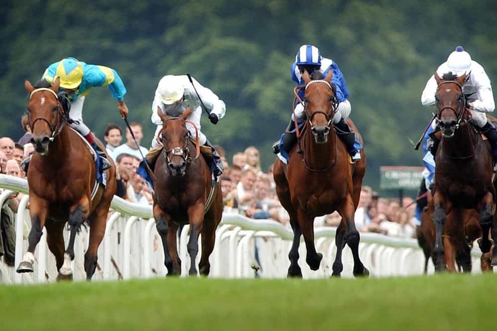 Falbrav and Darryll Holland (far left) beat Nayef (striped cap) in the 2003 Eclipse (Stefan Rousseau/PA)