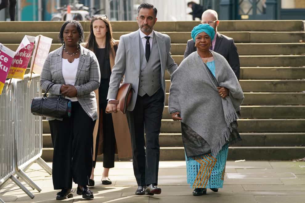A statement was released by Aamer Anwar, centre, on behalf of the Bayoh family (Andrew Milligan/PA)