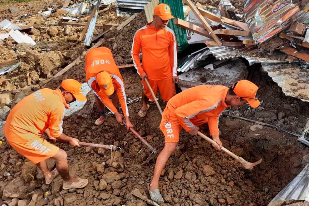 The death toll from a mudslide in northeastern India has risen to 16, with more than 70 people missing (National Disaster Response Force via AP)