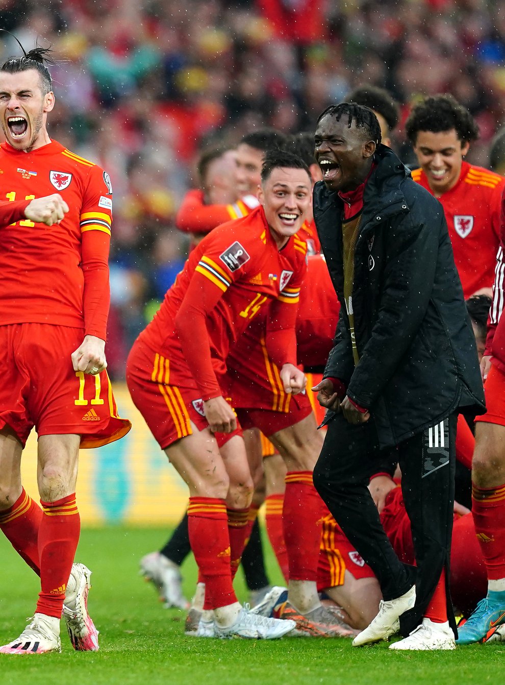 Wales’ Gareth Bale (left) celebrates with team-mates after qualifying for the Qatar World Cup following victory in the FIFA World Cup 2022 Qualifier play-off final match at Cardiff City Stadium, Cardiff (David Davies/PA)