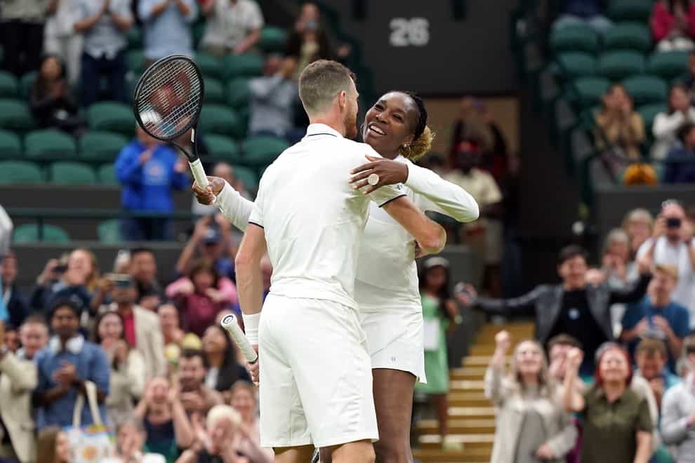 Jamie Murray and Venus Williams celebrate victory (Zac Goodwin/PA)