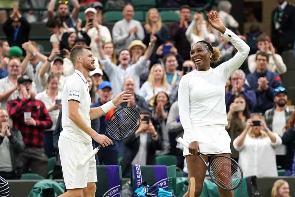 Jamie Murray and Venus Williams celebrate victory in the mixed doubles at Wimbledon (Zac Goodwin/PA)