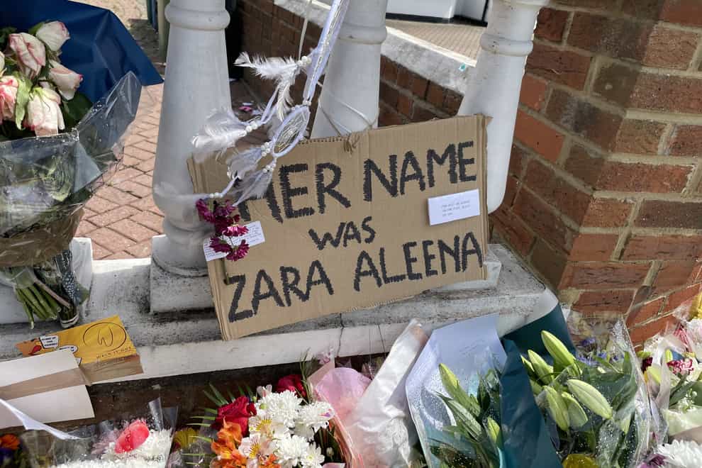 Floral tributes left at the scene on Cranbrook Road in Ilford, east London, where Zara Aleena, 35, was killed (Ted Hennessey/PA)