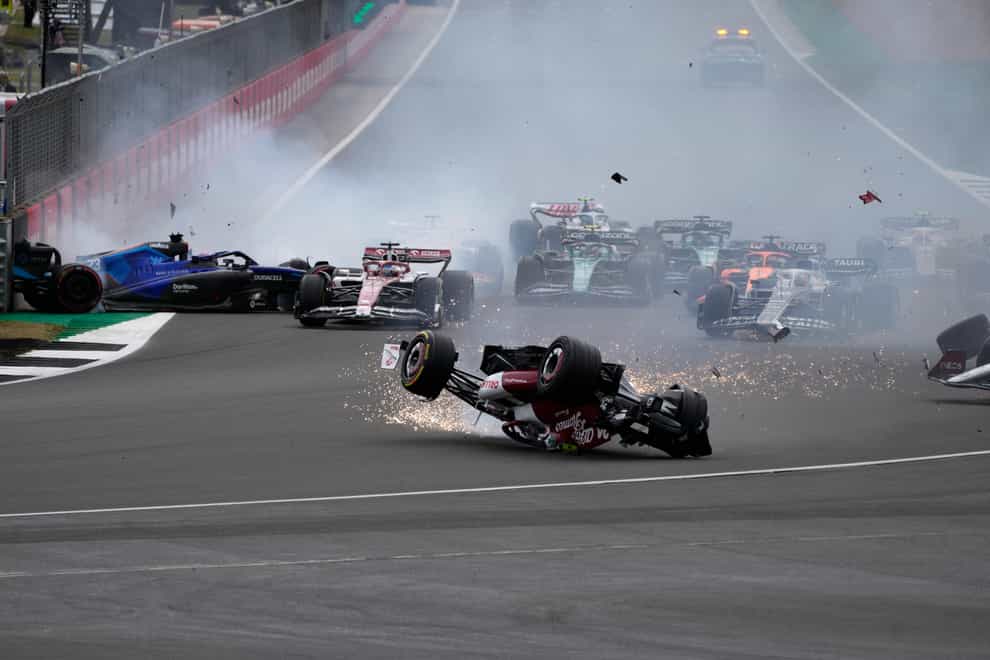 Alfa Romeo driver Guanyu Zhou crashes at the start of the British Grand Prix at Silverstone (Frank Augstein/AP).