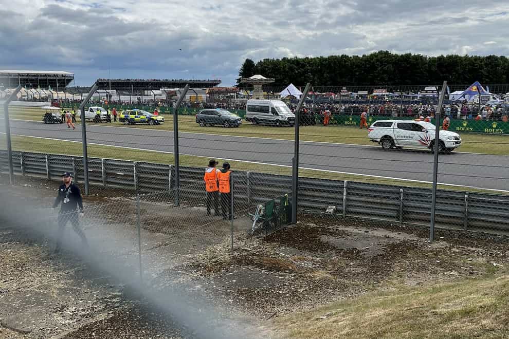 Protestors were removed from the Silverstone circuit in Sunday’s British Grand Prix (Helena Hicks/PA)