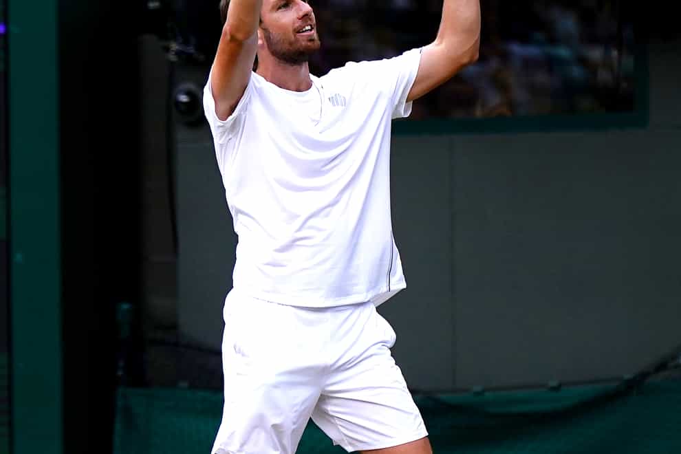 Cameron Norrie celebrates winning his Gentlemen’s Singles fourth round match against Tommy Paul on court 1 during day seven of the 2022 Wimbledon Championships at the All England Lawn Tennis and Croquet Club, Wimbledon. Picture date: Sunday July 3, 2022.