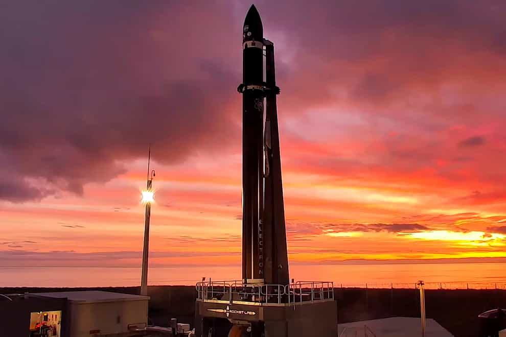 Rocket Lab’s Electron rocket waits on the launch pad in New Zealand (Rocket Lab via AP)