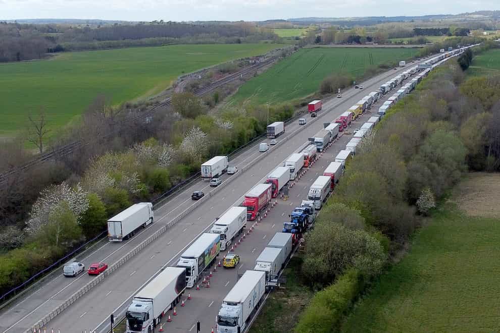 Lorries queue in Operation Brock on the M20 (PA)