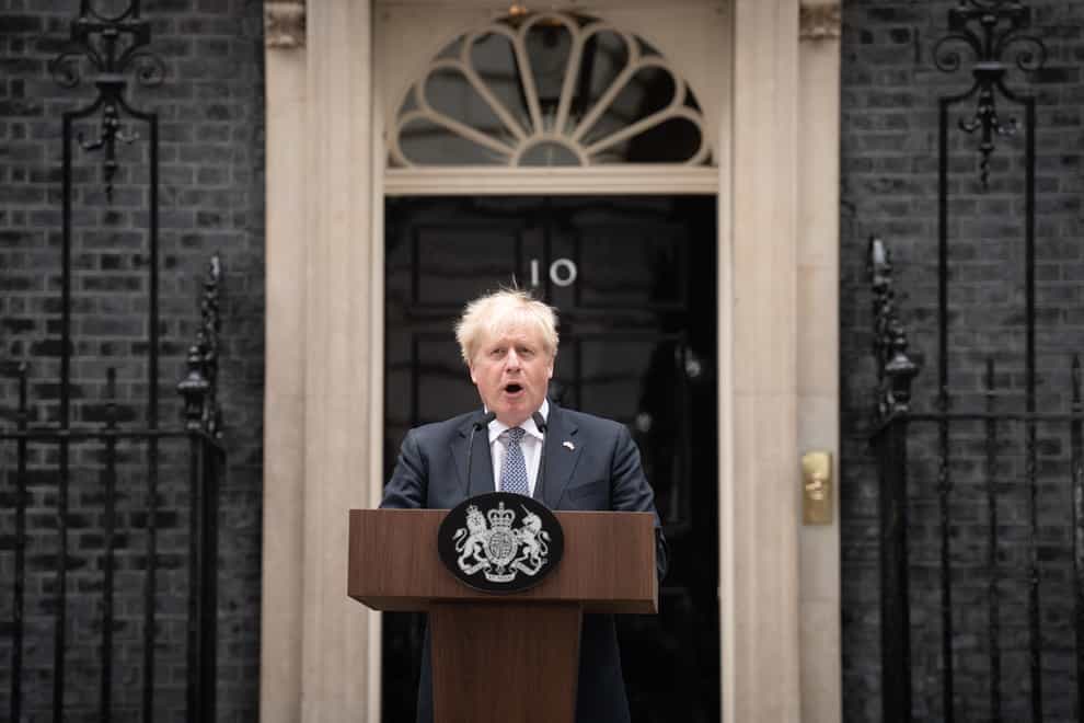 Prime Minister Boris Johnson reads a statement outside 10 Downing Street, London (Stefan Rousseau/PA)