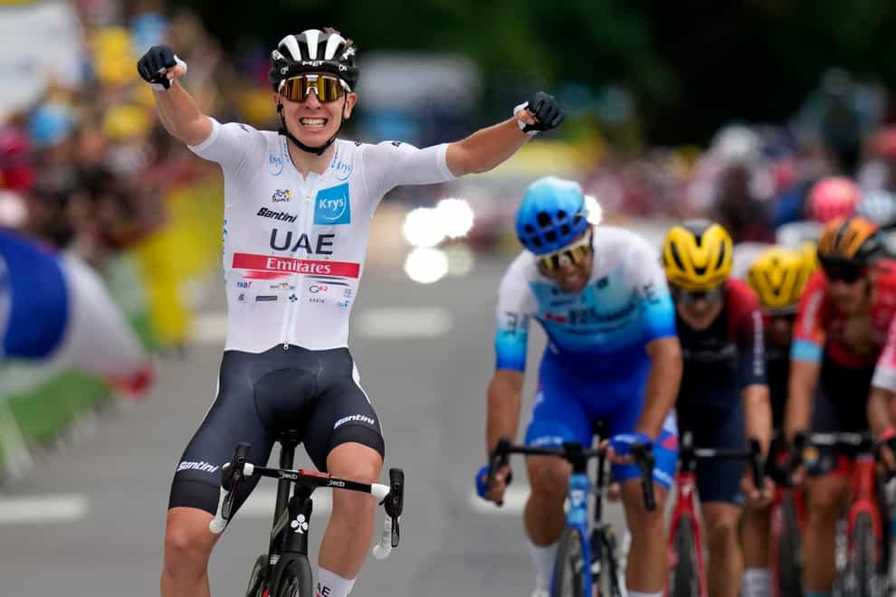 Tadej Pogacar won stage six of the Tour de France to move into the yellow jersey (Thibault Camus/AP)