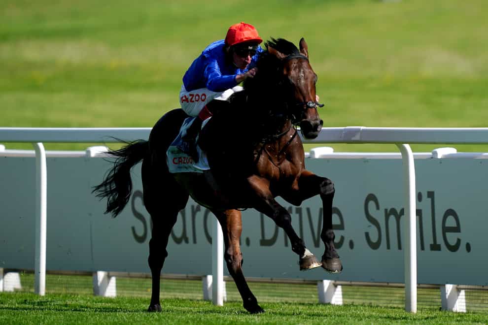Adayar ridden by Adam Kirby on their way to winning the Cazoo Derby during day two of the Cazoo Derby Festival at Epsom Racecourse. Picture date: Saturday June 5, 2021.