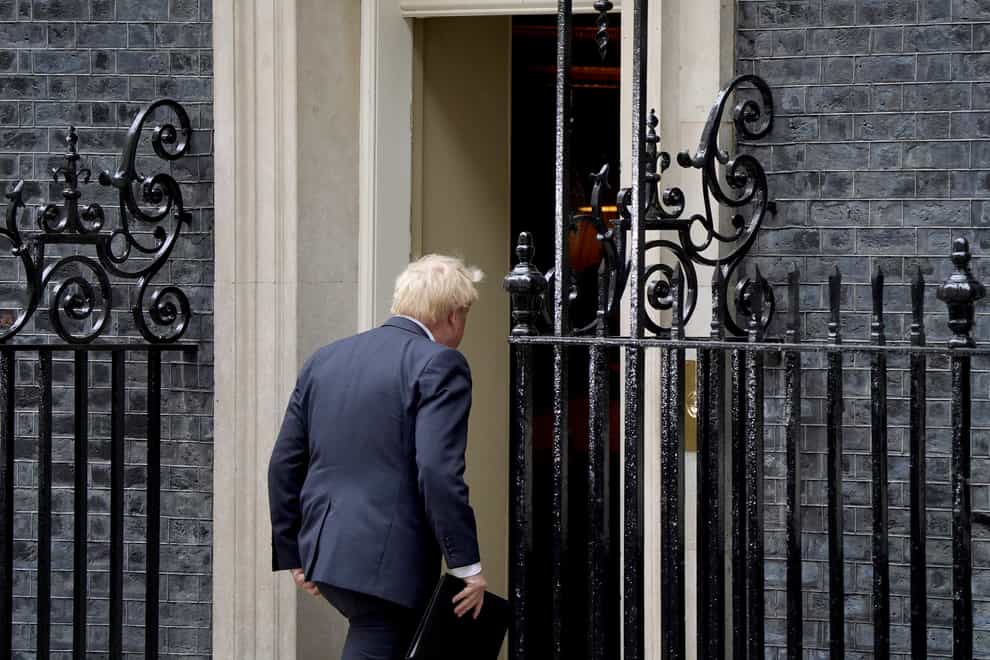 Boris Johnson returns inside to No 10 following his resignation speech (Gareth Fuller/PA)