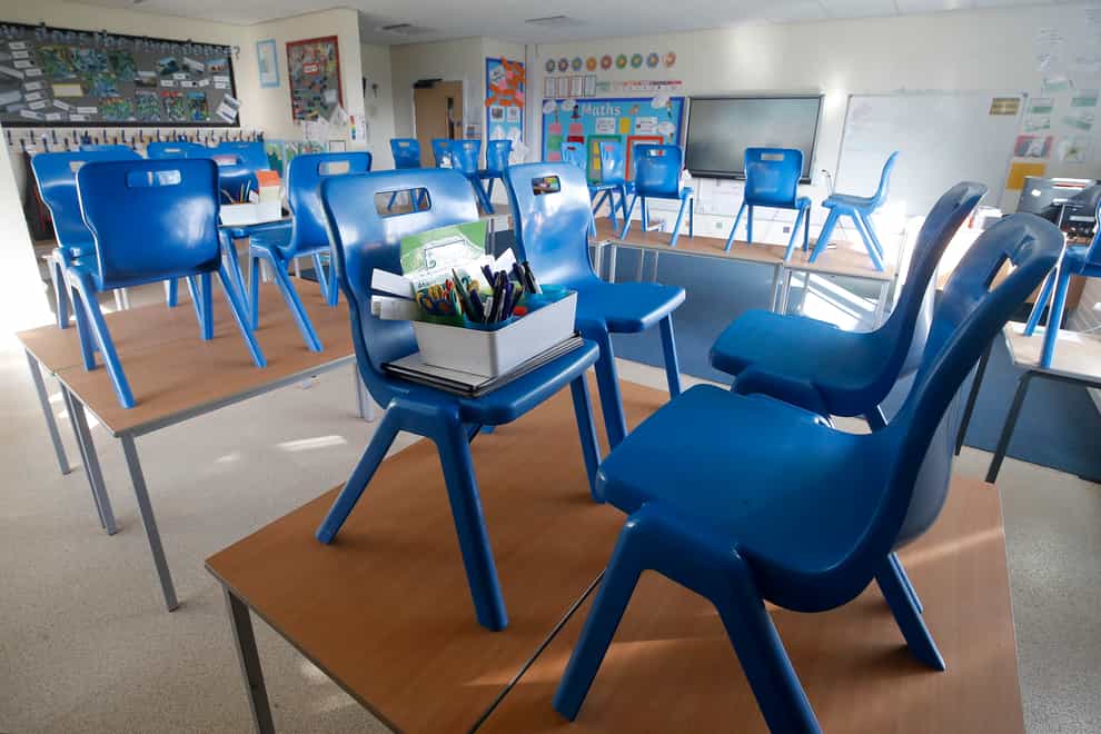 An empty classroom (Martin Rickett/PA)