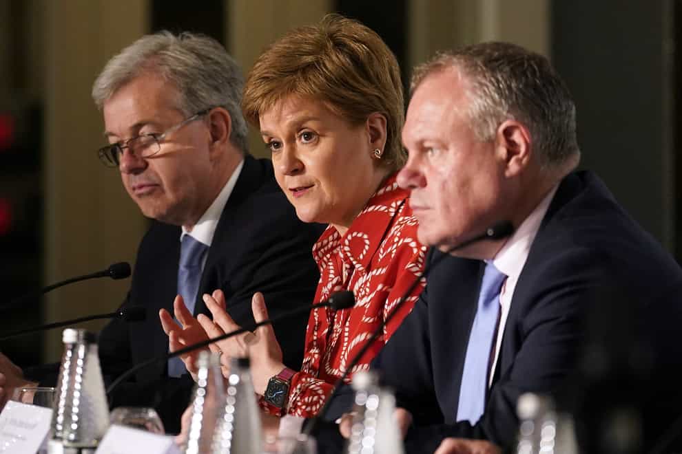 From left to right, chief minister of Jersey, John Le Fondre; Scottish First Minister Nicola Sturgeon and Minister of State for Northern Ireland Conor Burns (Andrew Matthews/PA)