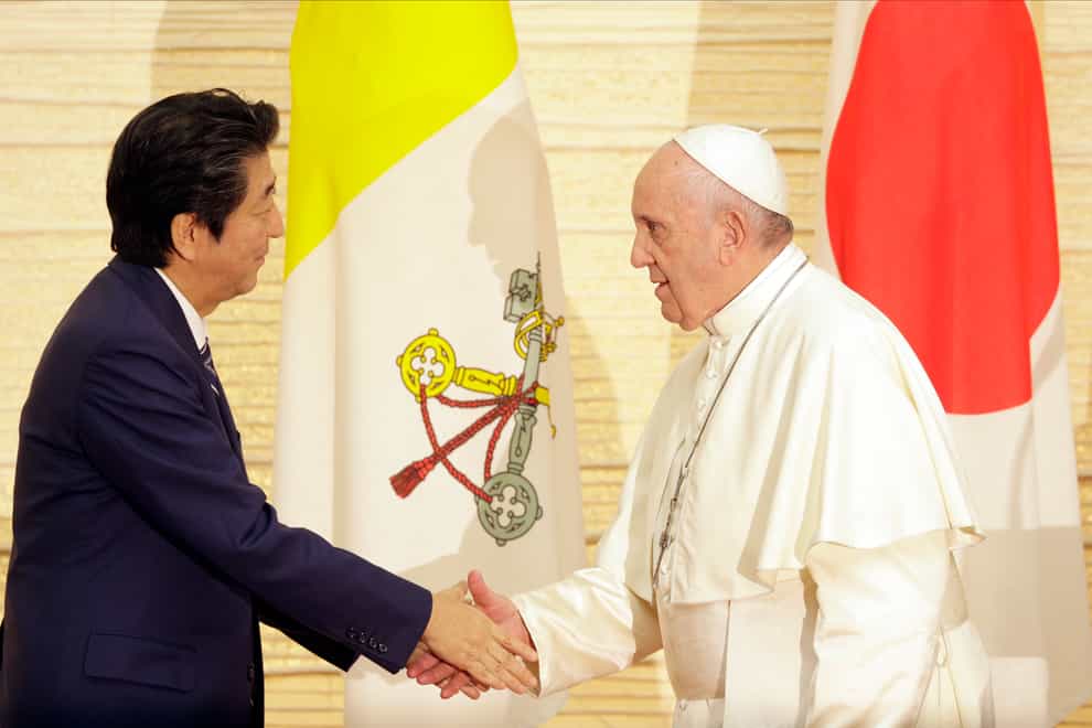 Pope Francis met then Japanese PM Shinzo Abe in Tokyo in November 2019 (Gregorio Borgia/AP)