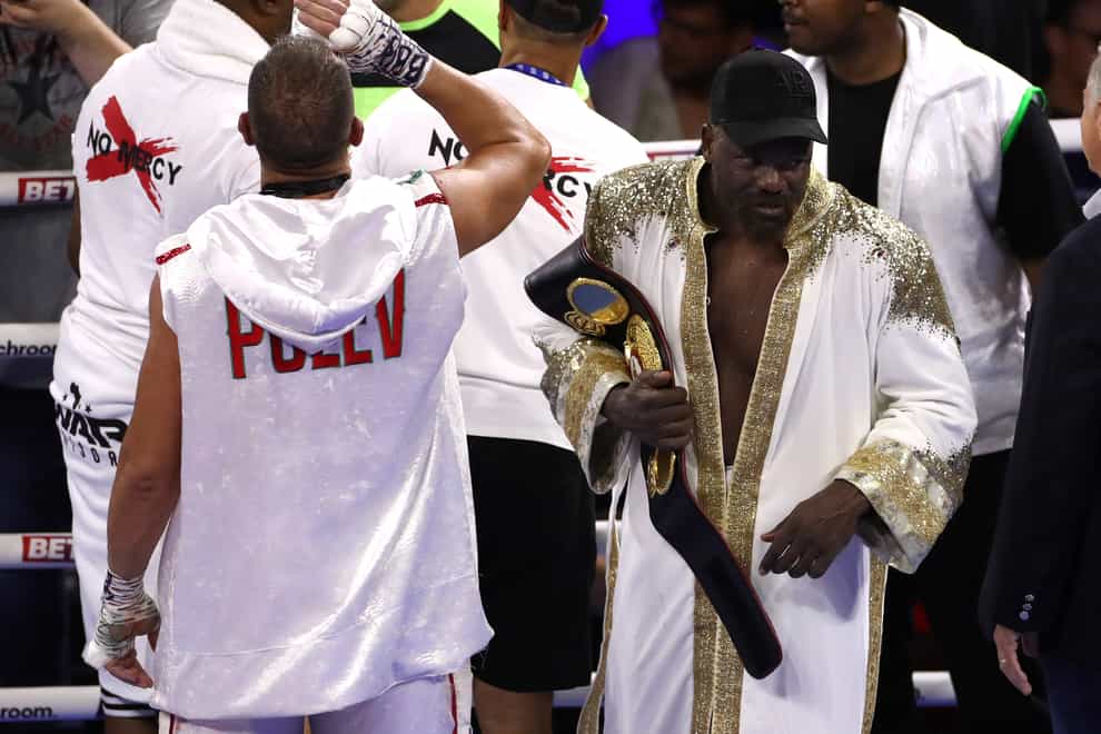 Derek Chisora celebrates after he beat Kubrat Pulev at the O2 Arena in London (Bradley Collyer/PA)