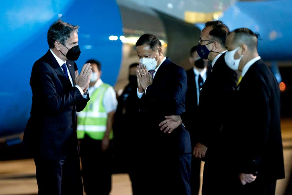 US Secretary of State Antony Blinken is greeted by officials on arrival in Bangkok, Thailand (Stefani Reynolds/pool/AP)