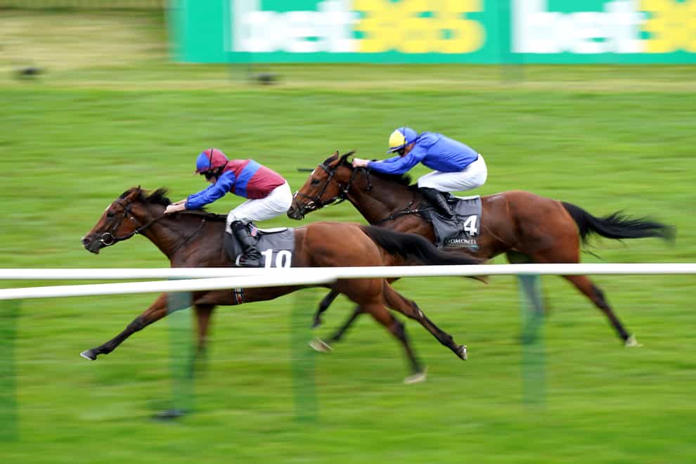 Tenebrism ridden by Ryan Moore (left) on their way to winning the Juddmonte Cheveley Park Stakes during Juddmonte Day of the Cambridgeshire Meeting at Newmarket Racecourse (Tim Goode/PA)