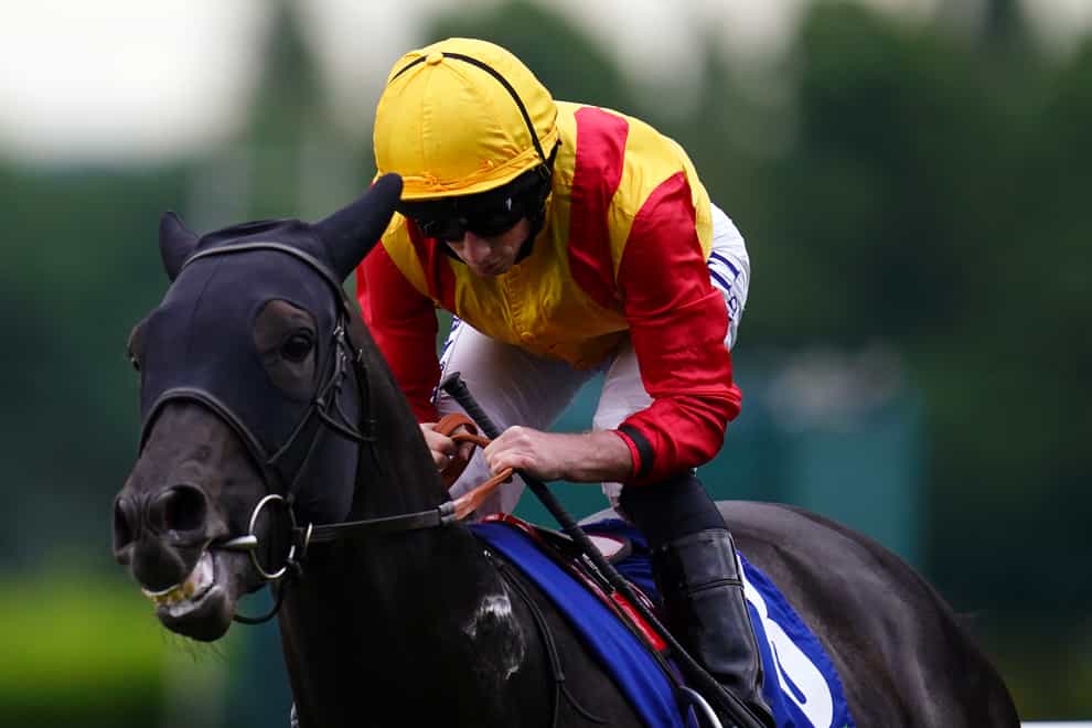 John Leeper, here ridden by Ryan Moore during the early stages of The Coral Henry II Stakes at Sandown, is being lined up for a tilt at the Sky Bet Ebor in August (John Walton/PA)