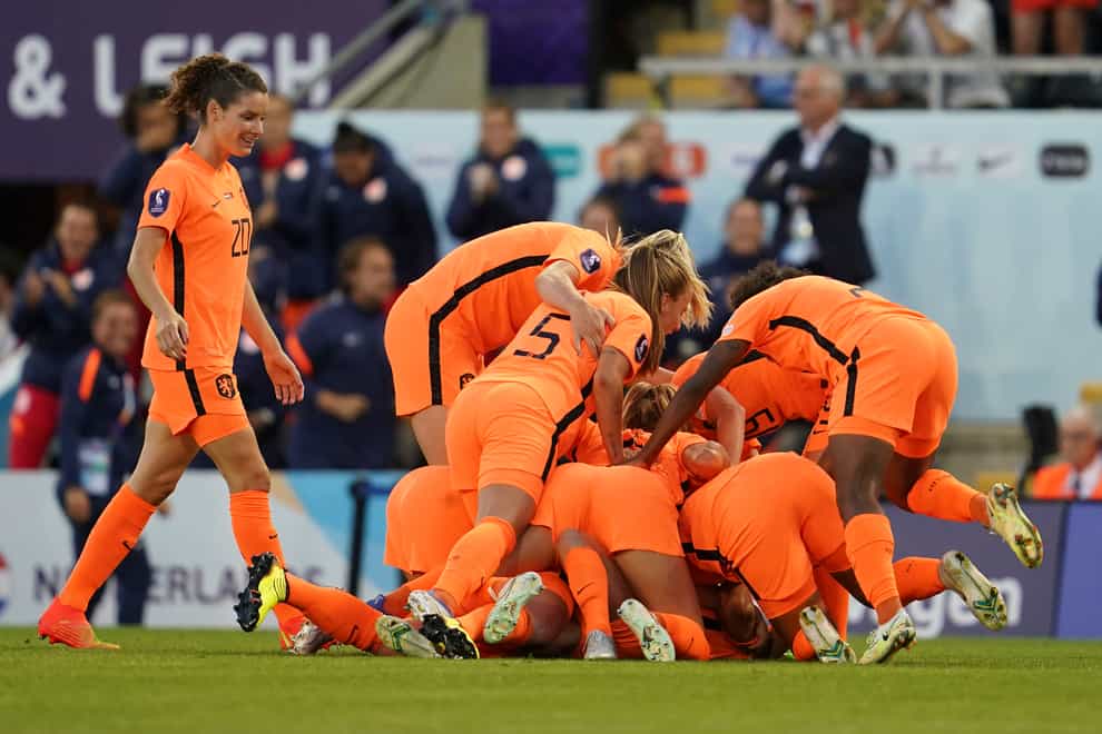 Holland celebrate after edging out Portugal (Jon Super/PA)