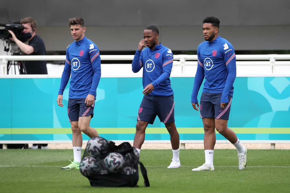 Mason Mount (left), Raheem Sterling (centre) and Reece James during England training at St George’s Park (Nick Potts/PA