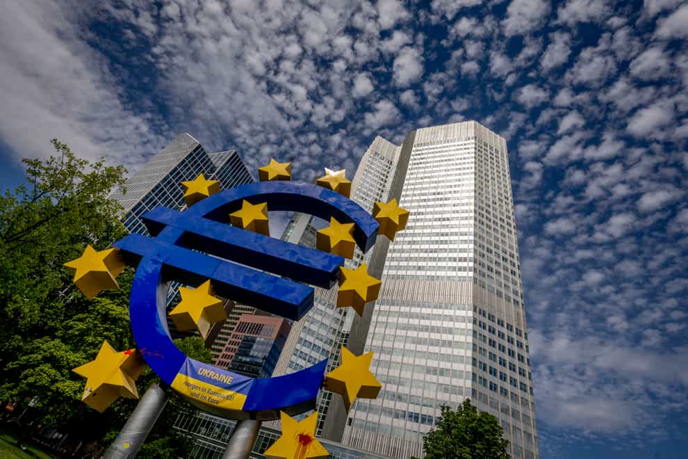 The euro sculpture in front of the former European Central Bank in Frankfurt, Germany (Michael Probst/AP)
