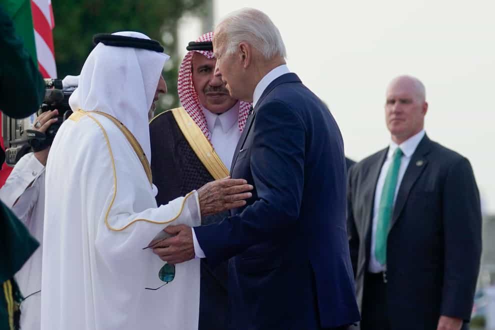 President Joe Biden is greeted by Saudi officials (Evan Vucci/AP)