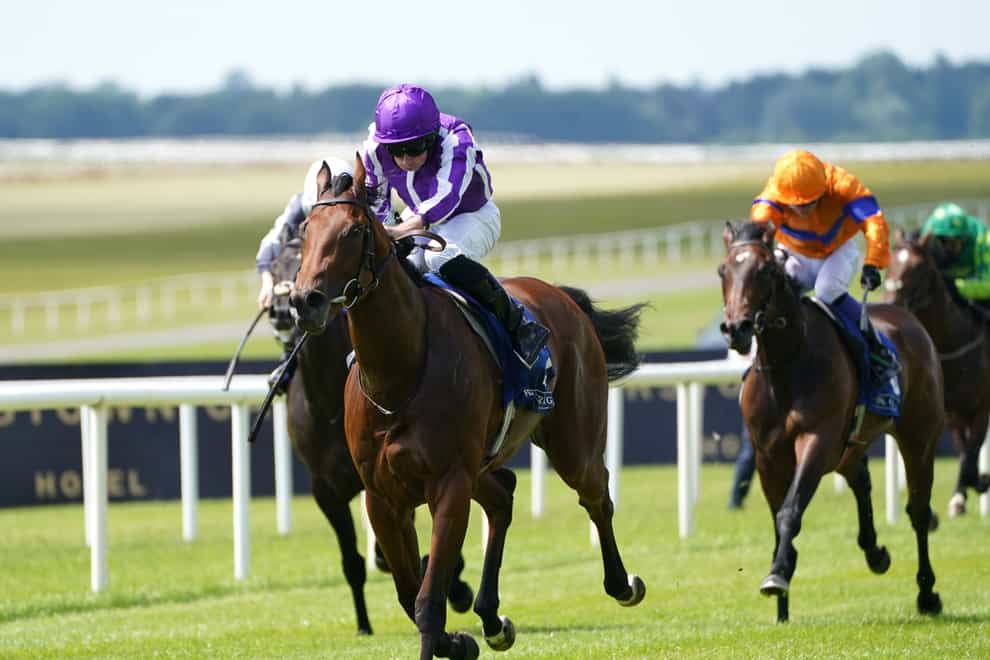 Little Big Bear ridden by Ryan Moore (left) on their way to winning the Jebel Ali Racecourse And Stables Anglesey Stakes at Curragh racecourse (Brian Lawless/PA)