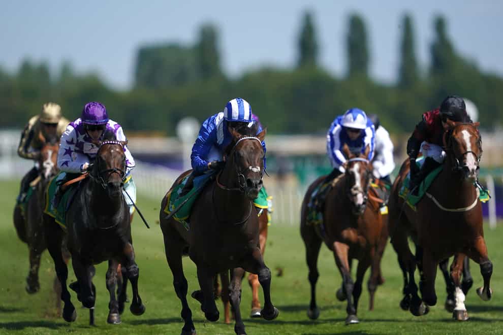 Minzaal ridden by Jim Crowley (third left) on their way to winning the bet365 Hackwood Stakes at Newbury racecourse (Zac Goodwin/PA)