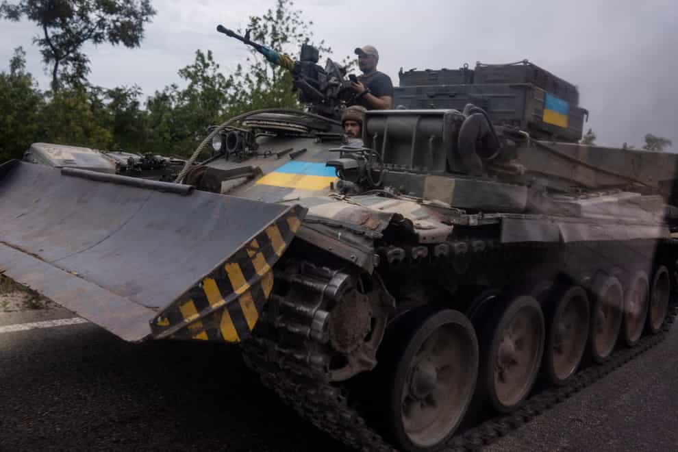 Ukrainian soldiers in a tank in Stupochky in the Donetsk region (Nariman El-Mofty/AP)