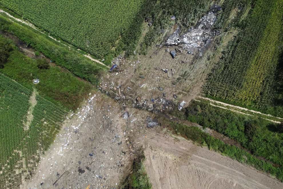 The site of the cargo plane crash in Palaiochori village, near the town of Kavala (Giannis Papanikos/AP)